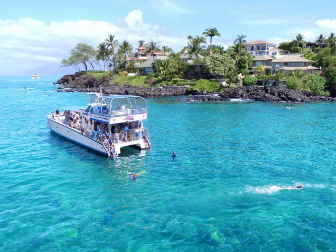 The Maui Magic sitting anchored in the water of the Maui Coastline.